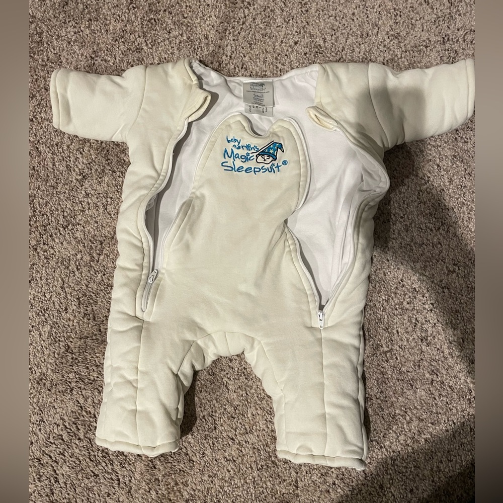 Merlin’s magic sleep suit swaddle transition sack